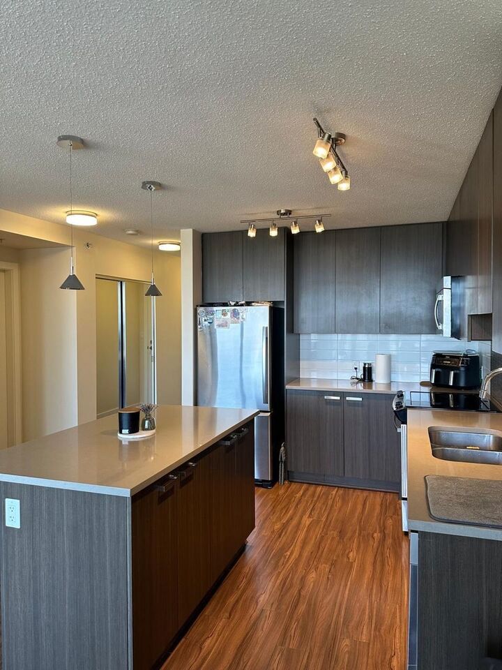 Property Photo: 13325 102A Avenue 3703 BC V3T 0J5