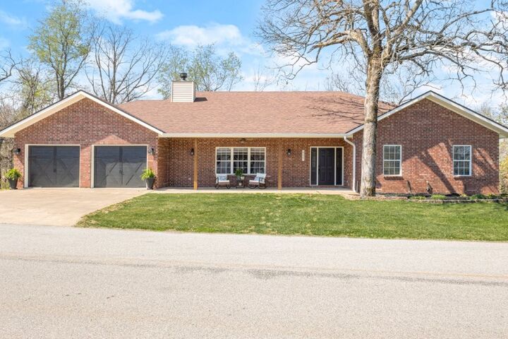 Property Photo:  8225 Old White River Road  AR 72756 