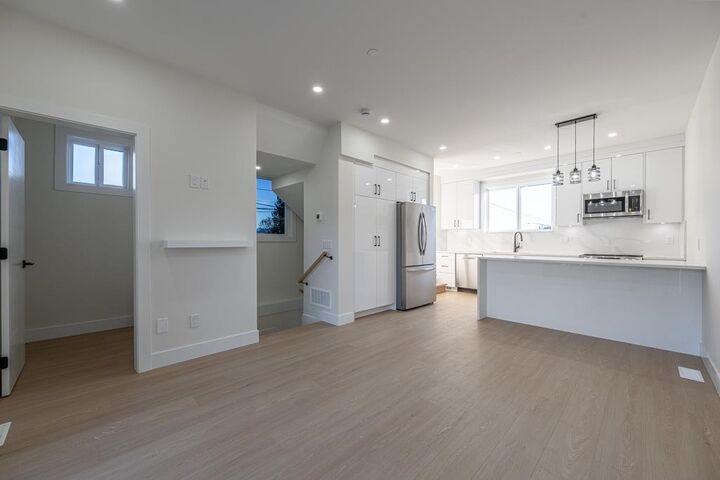 Property Photo:  7533 Wren Street B  BC V2V 3C1 