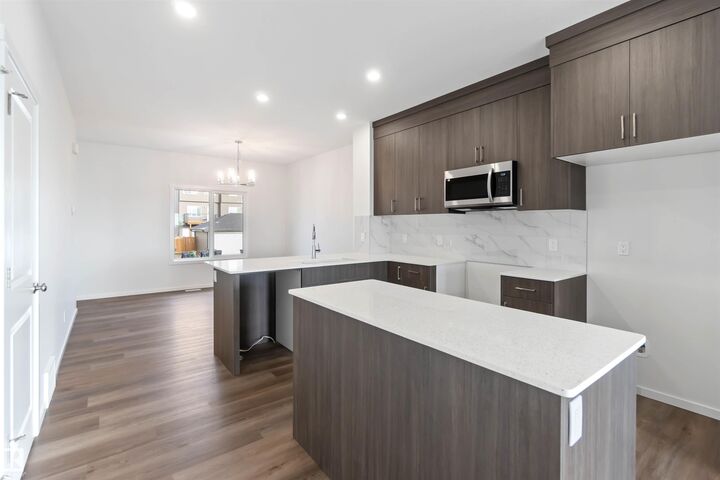 Property Photo: 5452 Hawthorn Run SW AB T6X 3K6