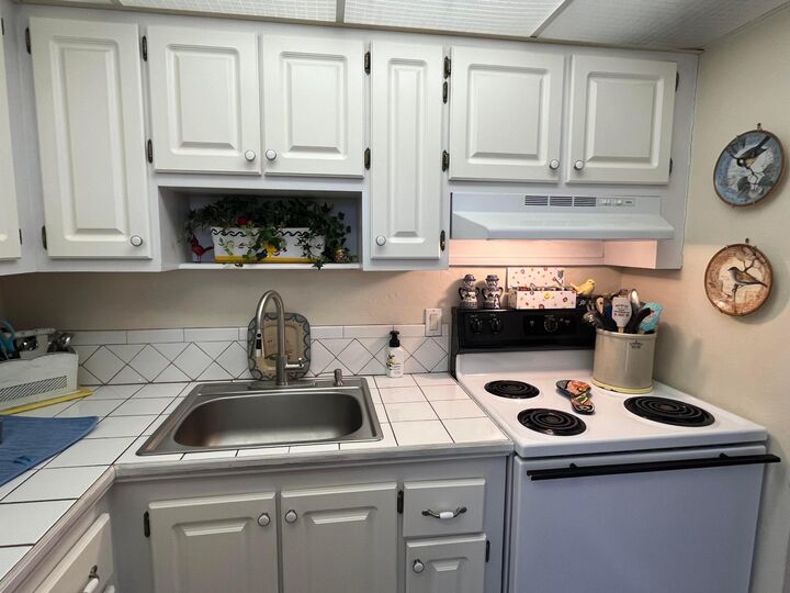 Property Photo:  2191 NE 1st Court 203  FL 33435 