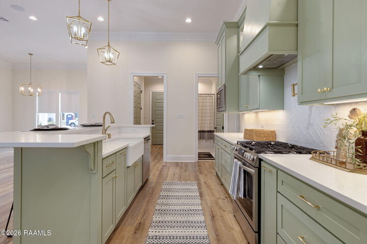 Property Photo:  104 Travelers Palm Way  LA 70518 
