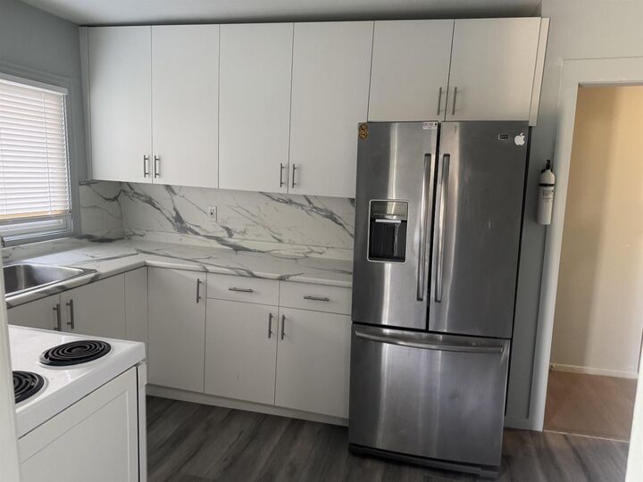 Photo de la propriété:  12893 114A Avenue  BC V3R 2N1 