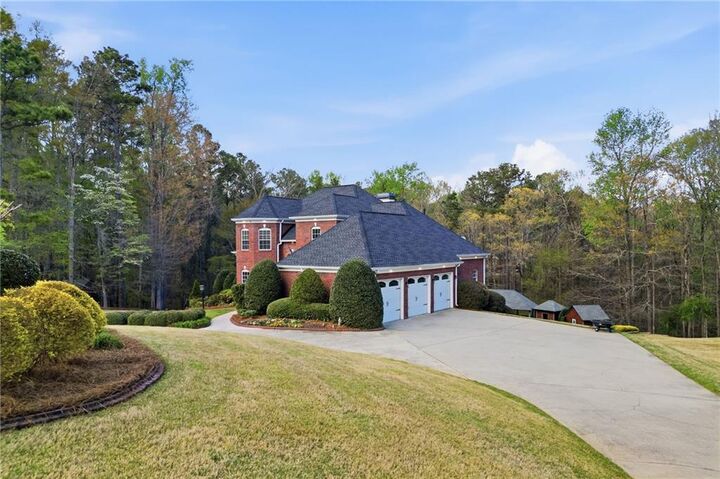 Property Photo:  5666 Chapel Hill Road  GA 30135 
