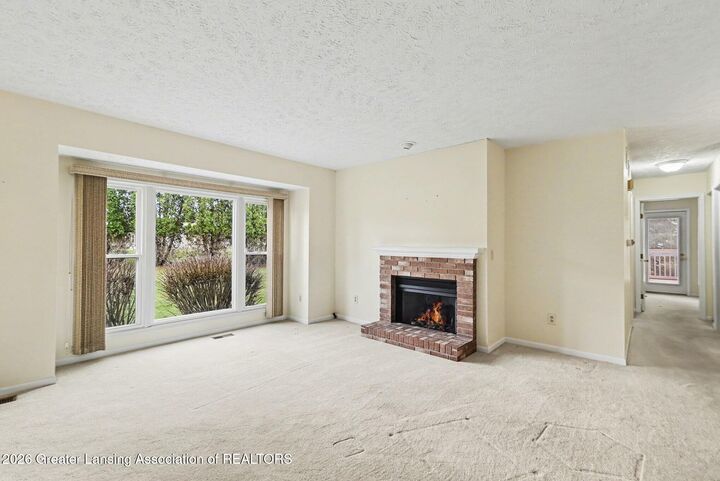 Property Photo:  7315 Chellmar Drive  MI 48917 