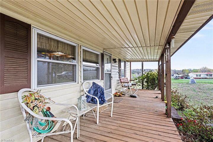 Property Photo:  1817 Amostown Road  NC 27046 