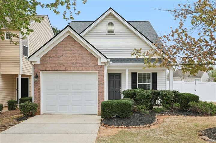 Property Photo: 6150 Smoke Ridge Lane GA 30041