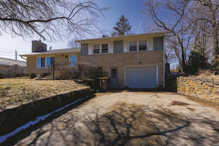 Property Photo:  1408 S Longwood Drive  IN 47401 