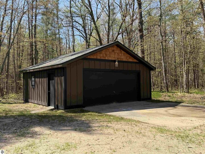Property Photo: 10852 NE Black Bear Road MI 49646
