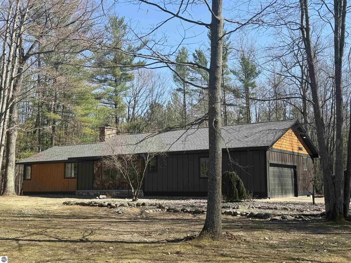 Property Photo:  10852 NE Black Bear Road  MI 49646 