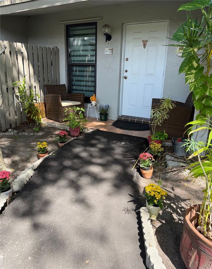 Property Photo:  10669 SW 113th Pl 84W  FL 33176 