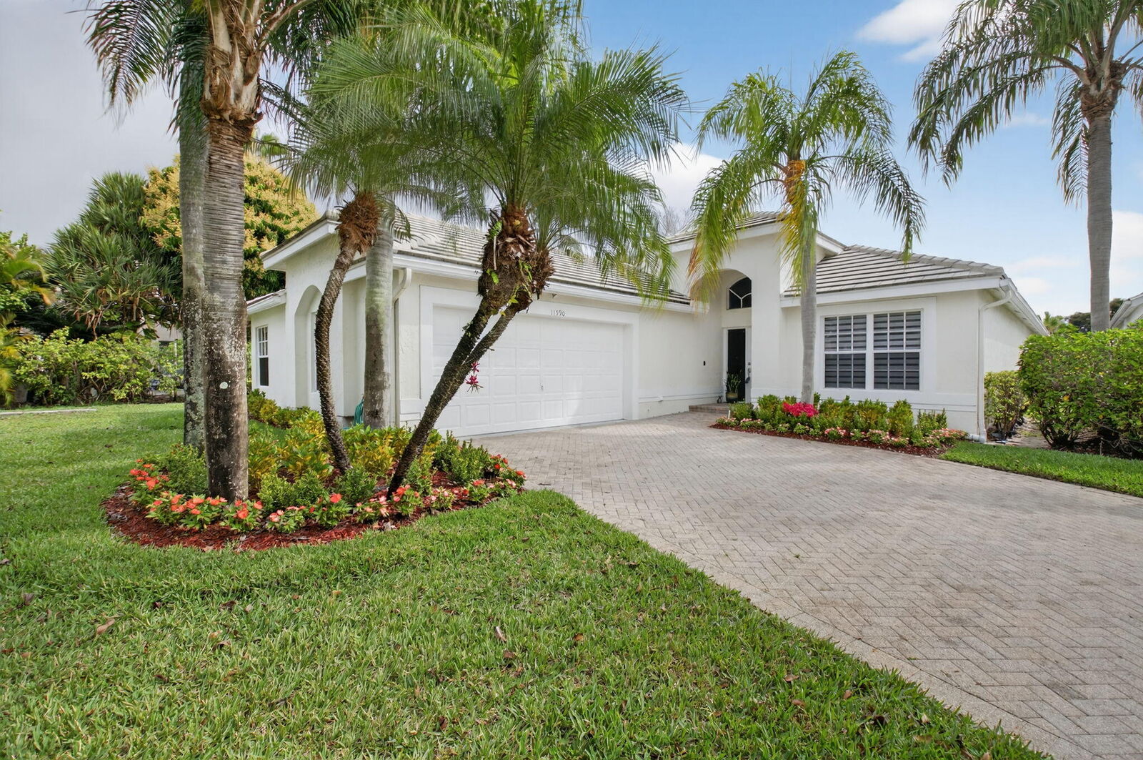 Property Photo: 11590 Creekside Drive FL 33437