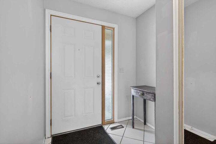 Property Photo:  53 Millrise Lane SW  AB T2Y 2C4 