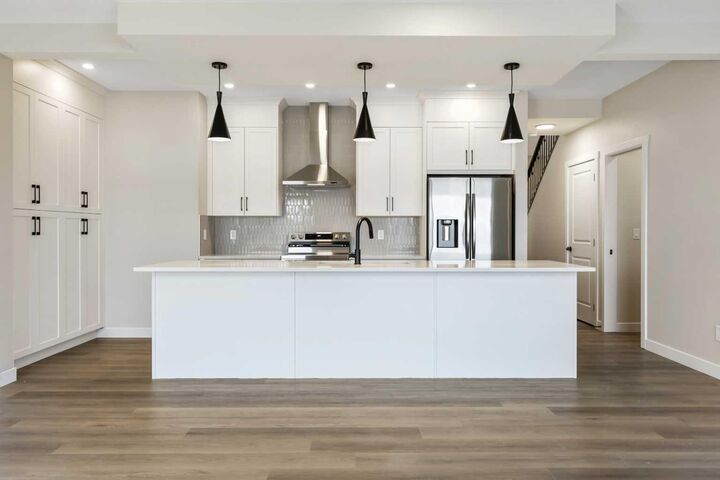 Property Photo: 825 Baywater Place SW AB T4B 3V3