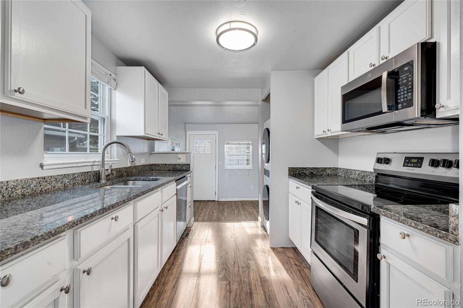 Property Photo:  1301 S Wolff Street  CO 80219 