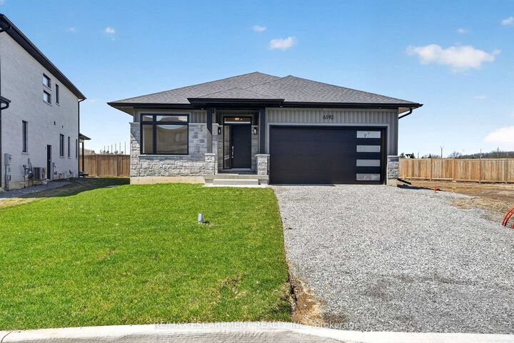 6192 Curlin Crescent — photo 1