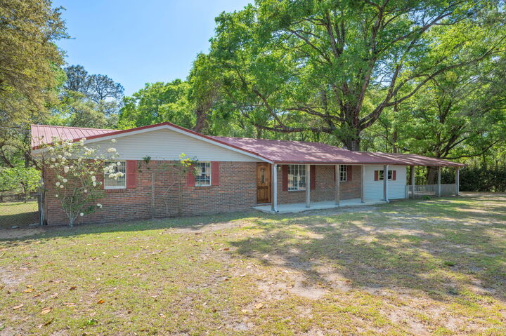 Property Photo:  5630 Buck Ward Road  FL 32531 
