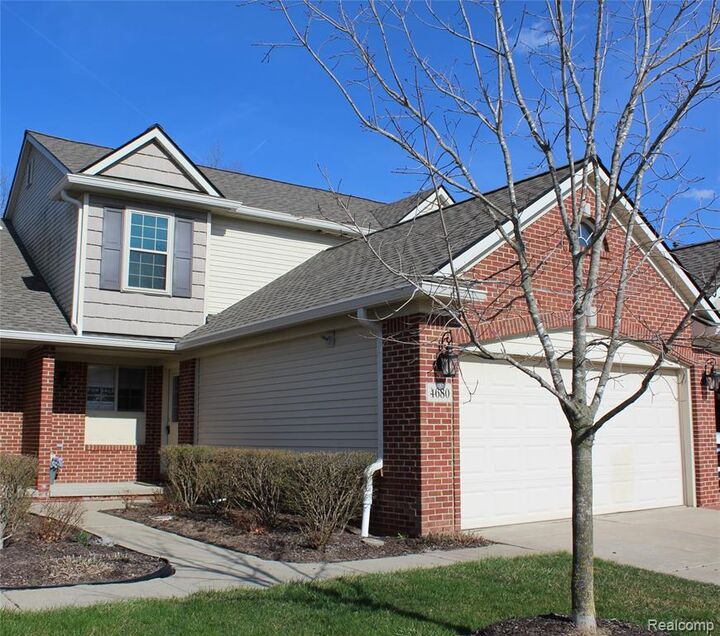 Property Photo:  4680 Summer Ridge Drive 42  MI 48843 9082 
