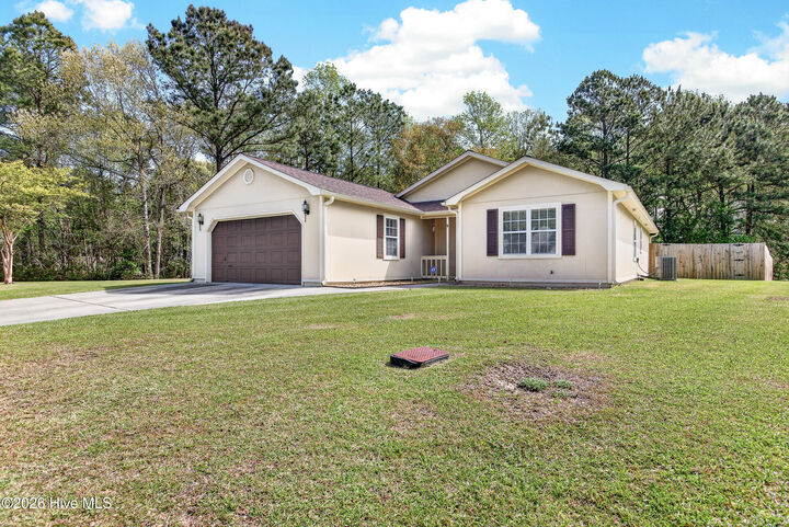 Property Photo:  119 Foxlair Drive  NC 28539 