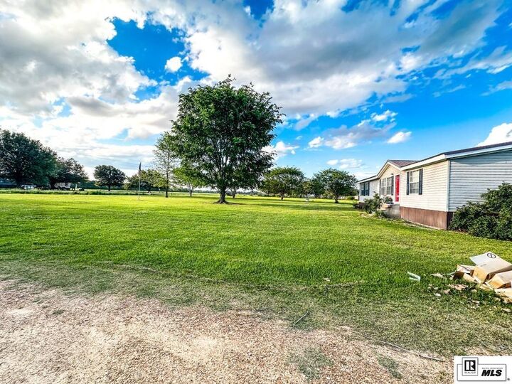 Property Photo:  501 Highway 874  LA 71295 