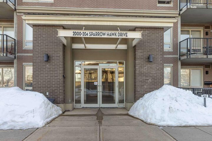 Property Photo:  204 Sparrow Hawk Drive 2117  AB T9K 0P1 