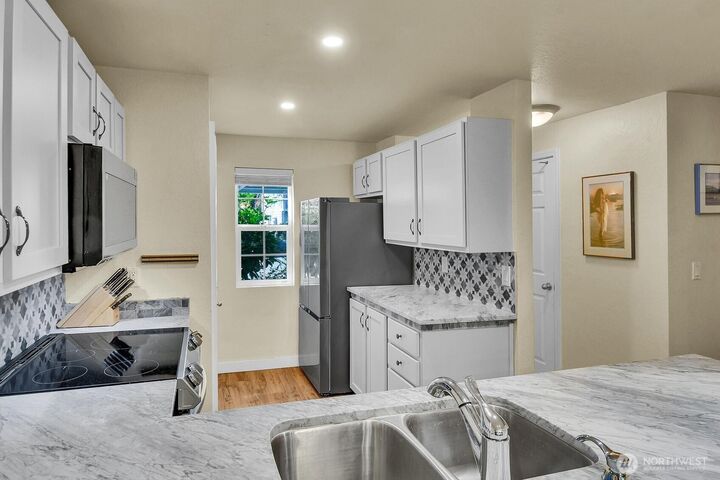 Property Photo:  13020  102nd Lane NE 5  WA 98034 