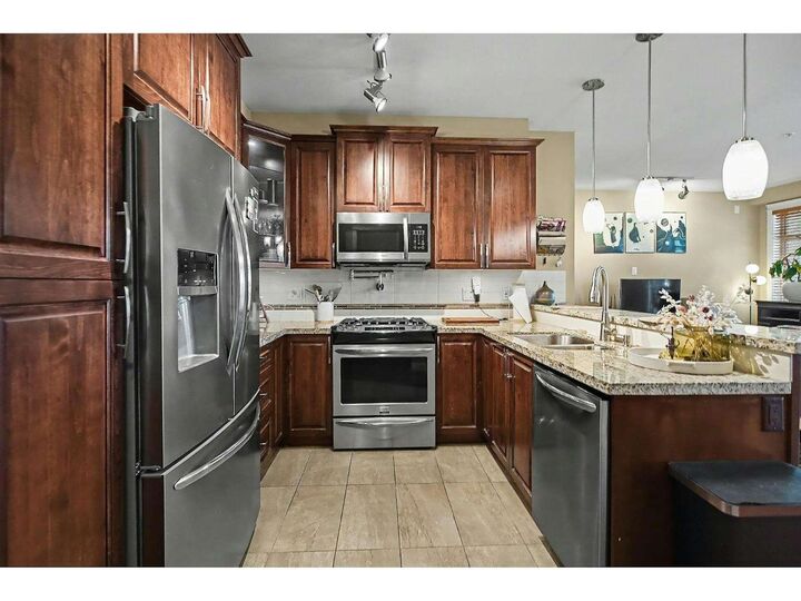 Property Photo: 2860 Trethewey Street 427 BC V2T 0G5