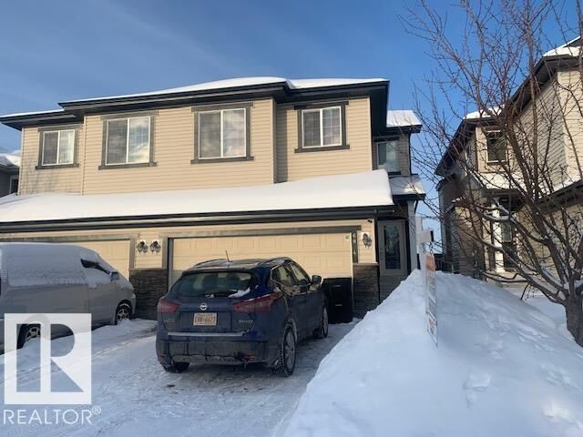 Property Photo:  6934 19A Avenue SW  AB T6X 0M1 