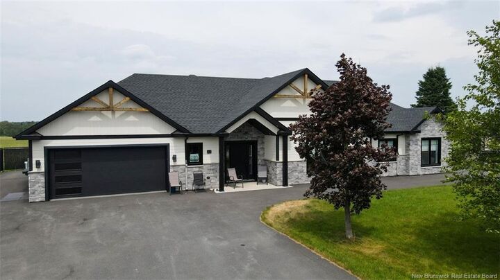 Property Photo: 42 Chouinard Street NB E8A 1L3