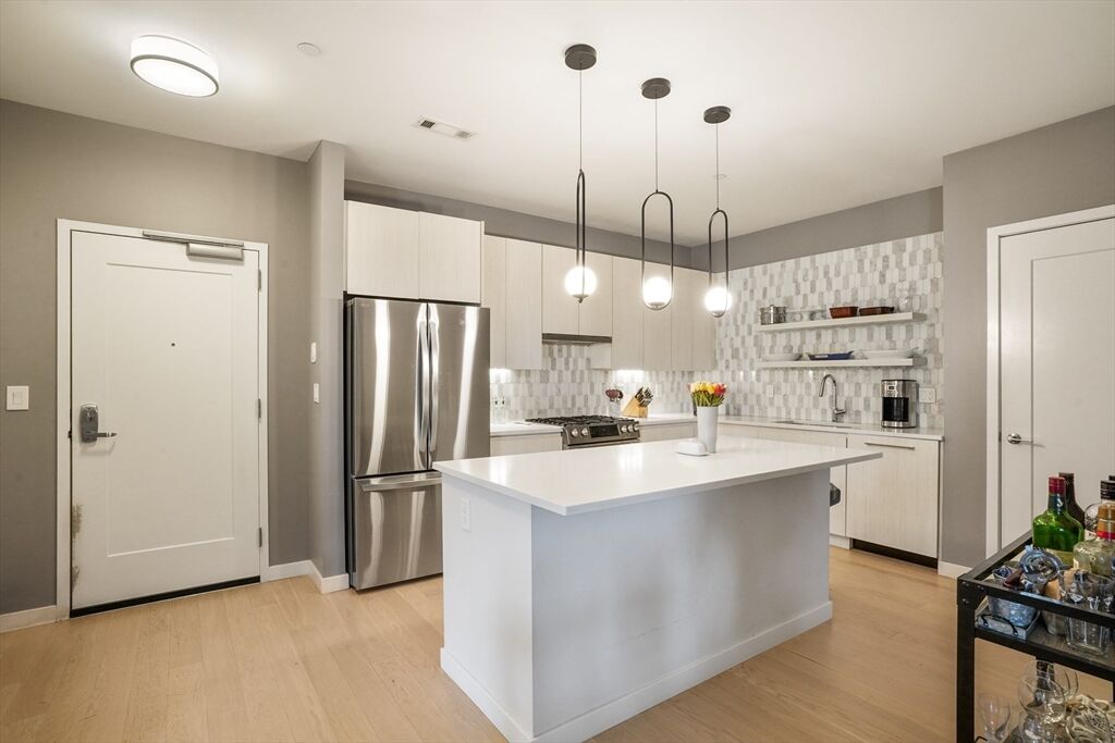 Property Photo:  45 W 3rd St 313  MA 02127 