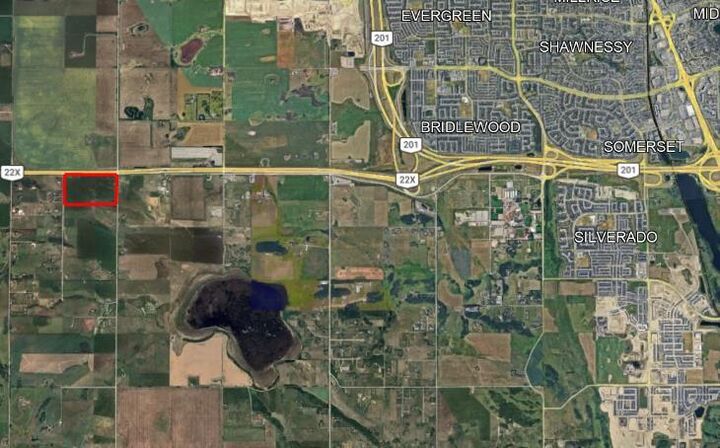 Property Photo: Hwy 22X (Spruce Meadows Trail West) &Amp 128 Street W AB T1S 0W8