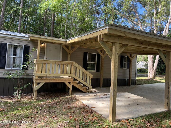 Property Photo:  9738 Limu Place  MS 39525 