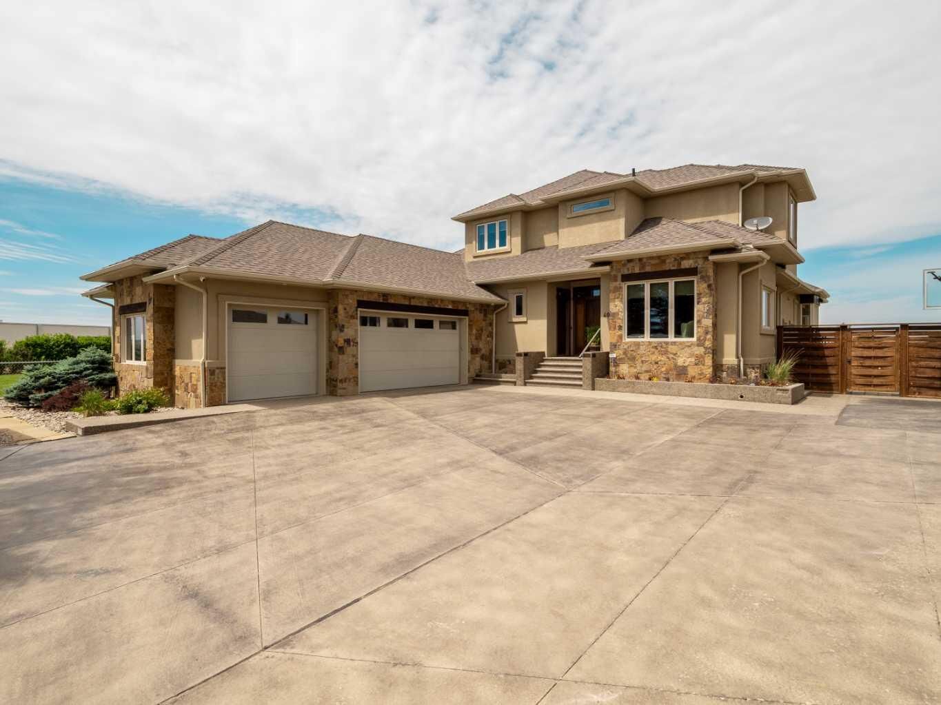Property Photo:  402 Meadow Lark Drive W  AB T1J 5R8 