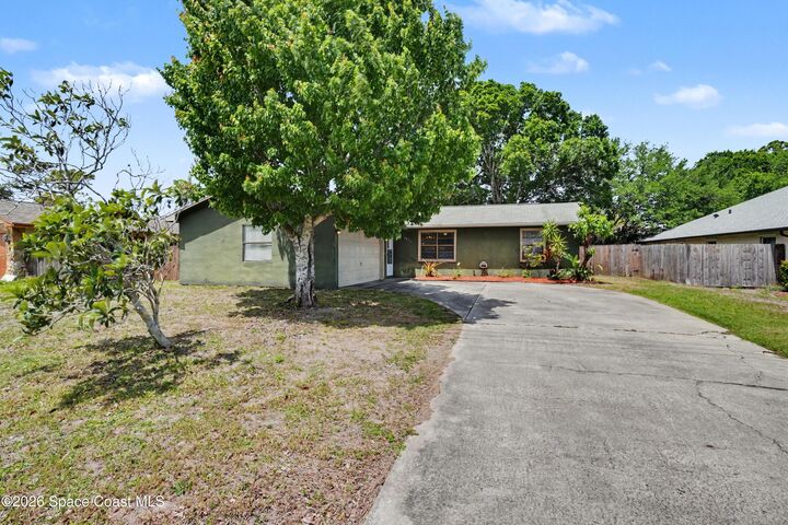 Property Photo: 3815 Jupiter Boulevard SE FL 32909