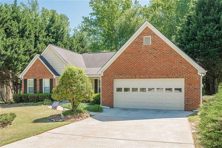 Property Photo:  7730 Timberline Ovlk  GA 30041 