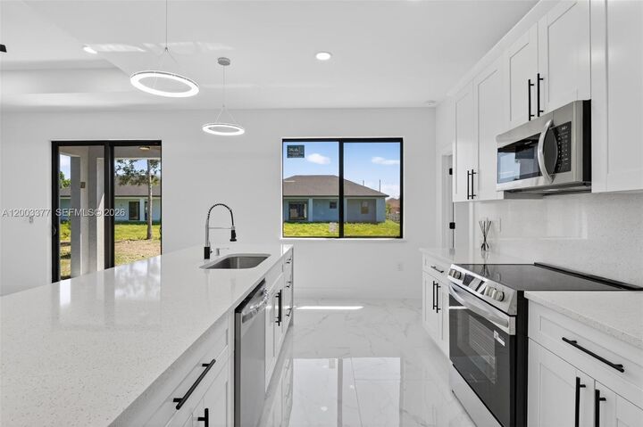 Property Photo:  3903 SW 11  FL 33976 