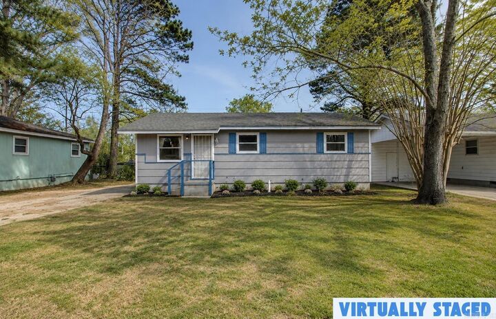 Property Photo:  7100 Redwood  AR 72209 