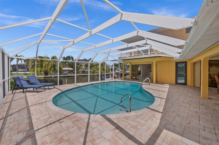 Property Photo:  1223 SW 51st Street  FL 33914 