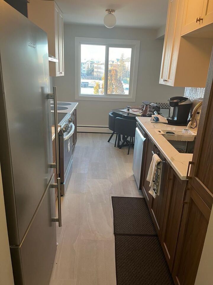 Property Photo: 10014 Morrison Street 302 AB T9H 2H1