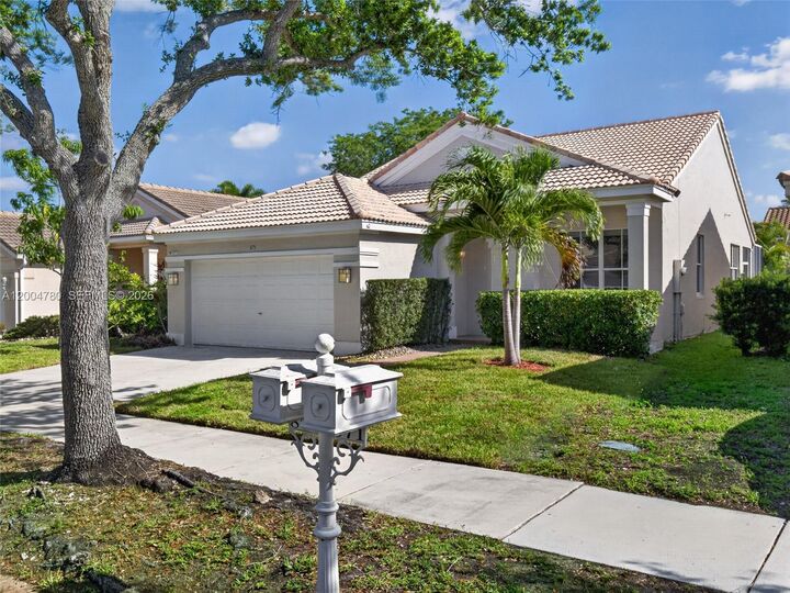 Property Photo:  875 Savannah Falls Dr .  FL 33327 