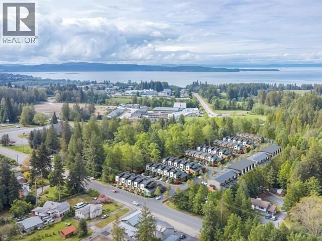 Property Photo:  104-5191 Manson Ave  BC V8A 3P2 