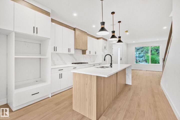 Property Photo: 11138 126 Street NW AB T5M 0P9