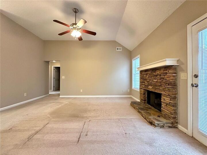 Property Photo:  7080 Shady Oak Lane  GA 30040 