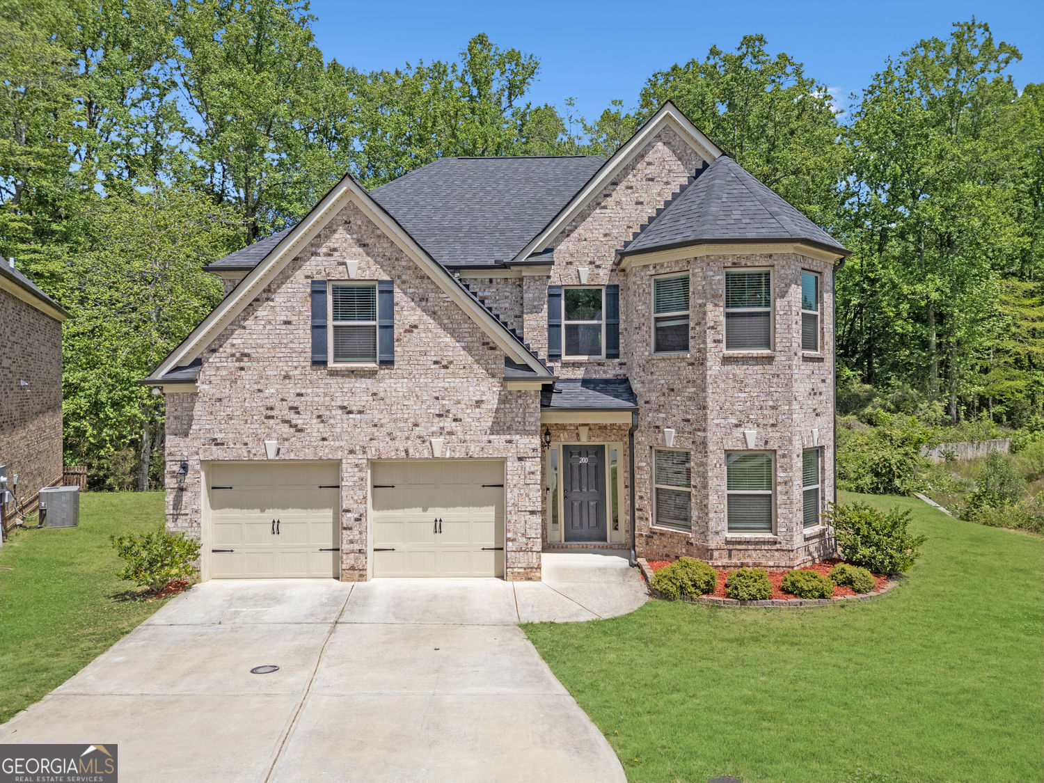 Property Photo:  200 Sanctuary Drive  GA 30046 