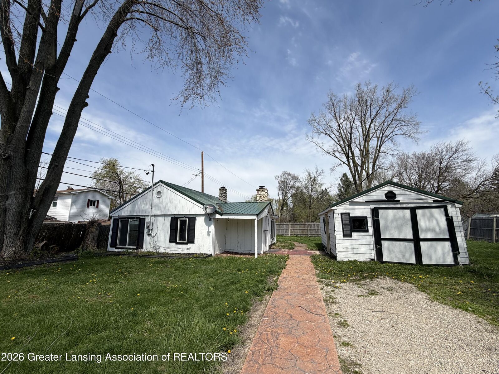 Property Photo:  3024 W Jolly Road  MI 48911 