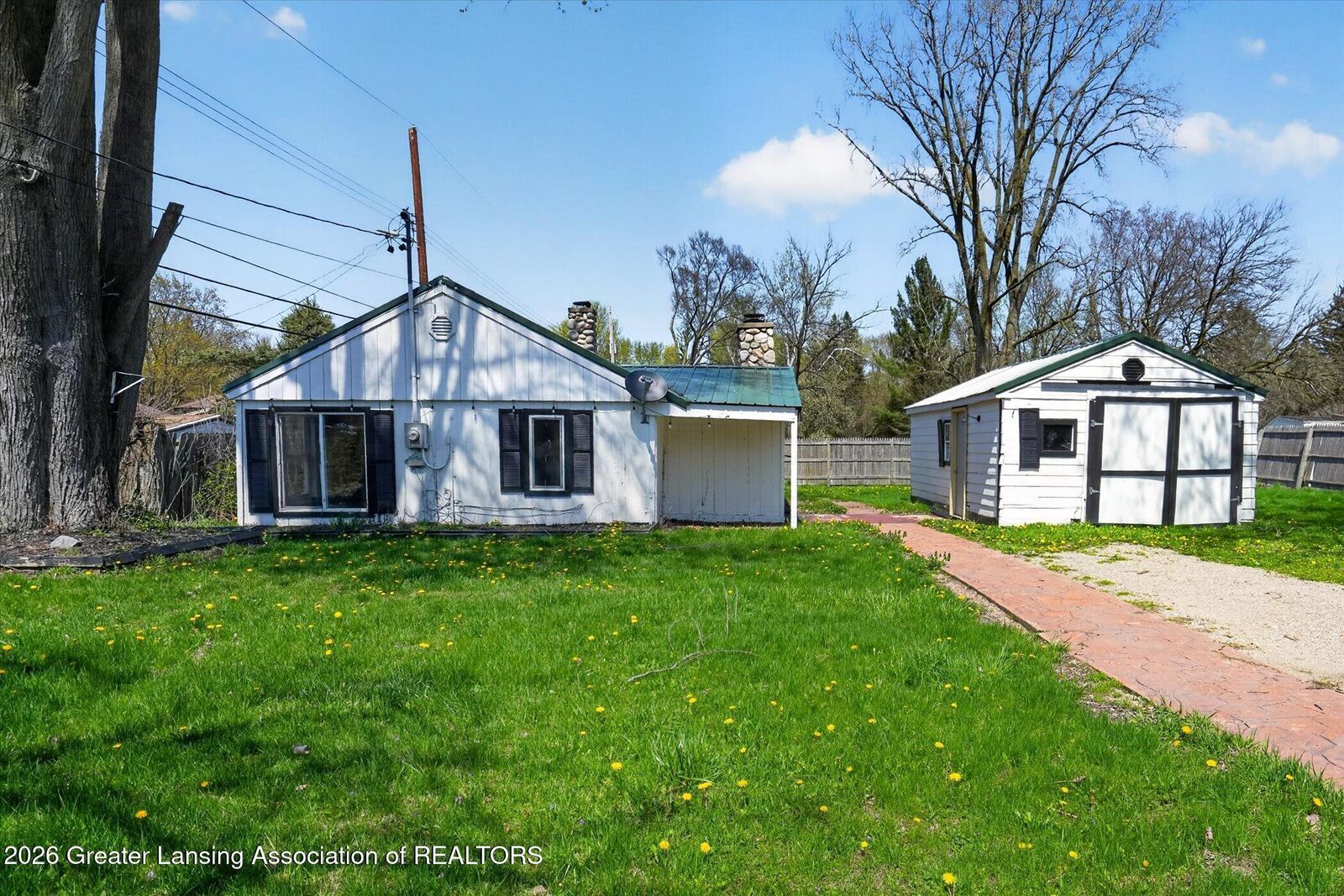 Property Photo:  3024 W Jolly Road  MI 48911 