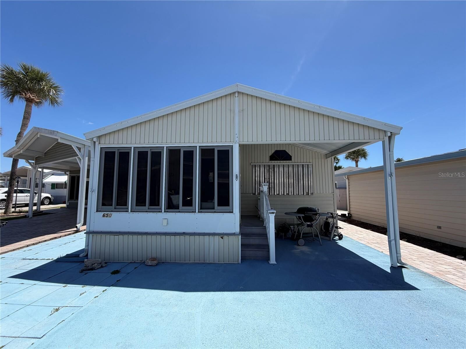 Property Photo:  9000 US Highway 192 650  FL 34714 