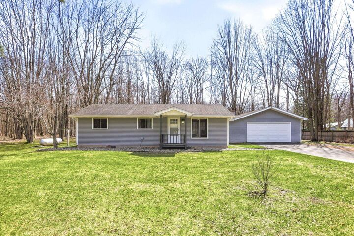 Property Photo:  249 W Miller Road  MI 48640 