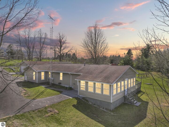 Property Photo:  10976 E 3 Mile Road  MI 49656 