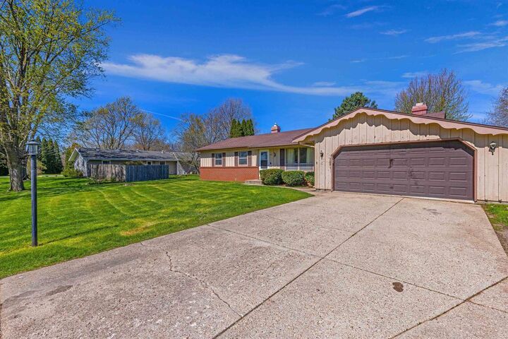 Property Photo:  621 E Holly Road  WI 53511 